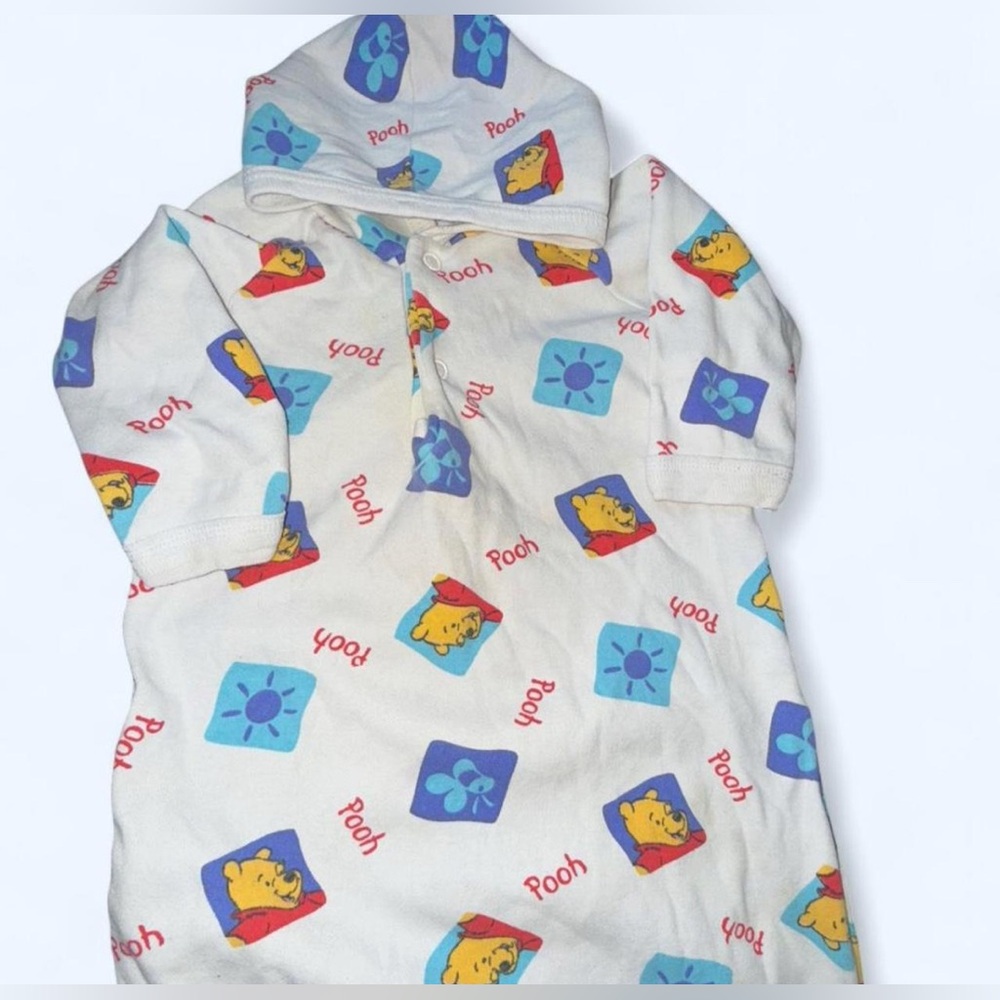Winnie the Pooh baby onesie.